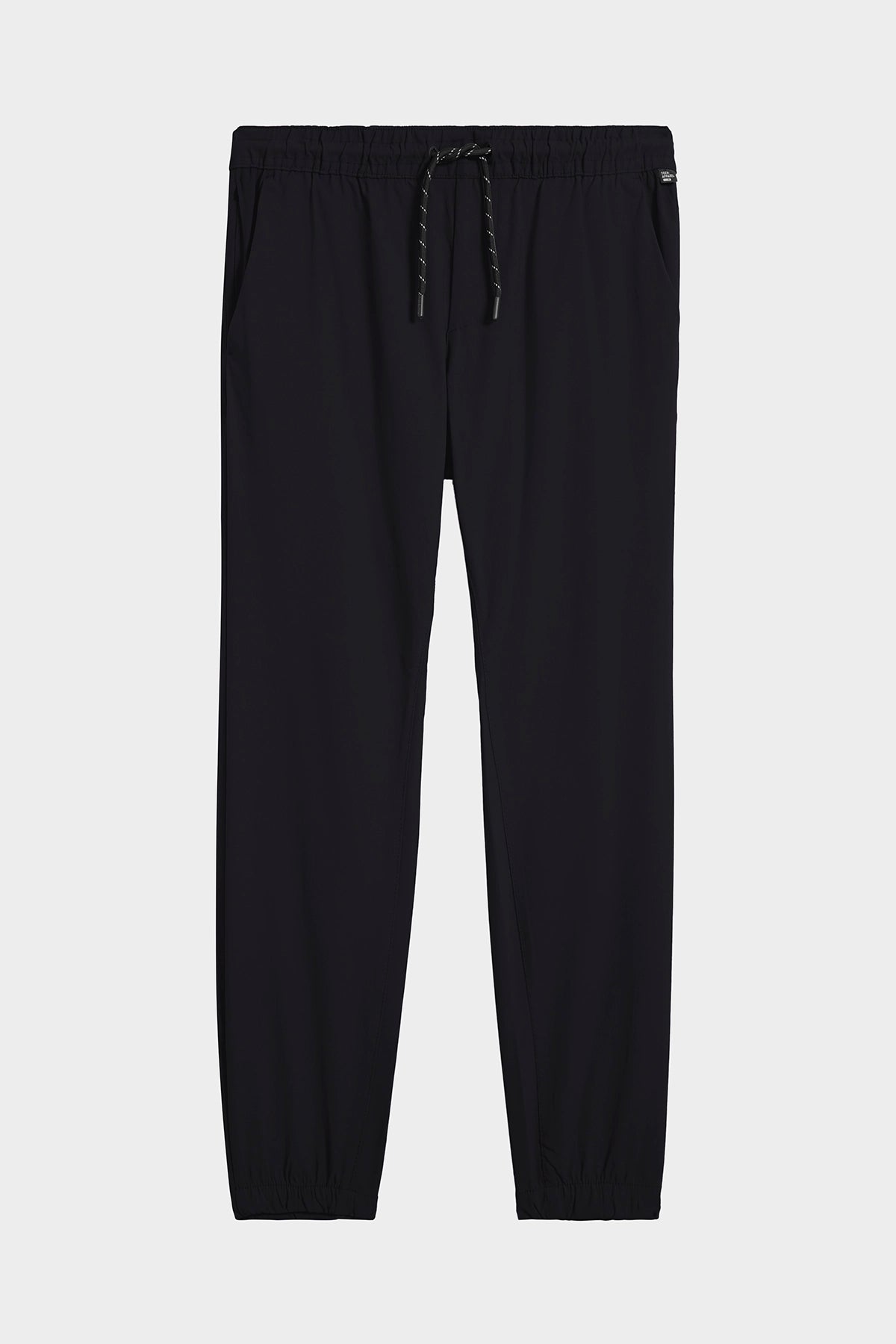 The TECH APPAREL MENS DRI-FLEX JOGGER for men features an athletic fit, elastic waistband with drawstring, elastic ankle cuffs, and side pockets; shown laid flat on a plain white background.